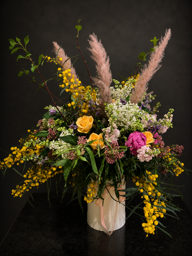 By boxes with flowers Delphine in Marbella